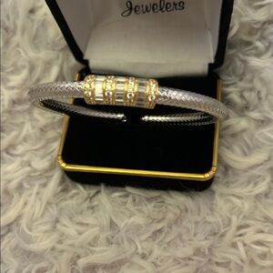 Elegant Silver and Gold Bracelet With Baguettes and Round Stones